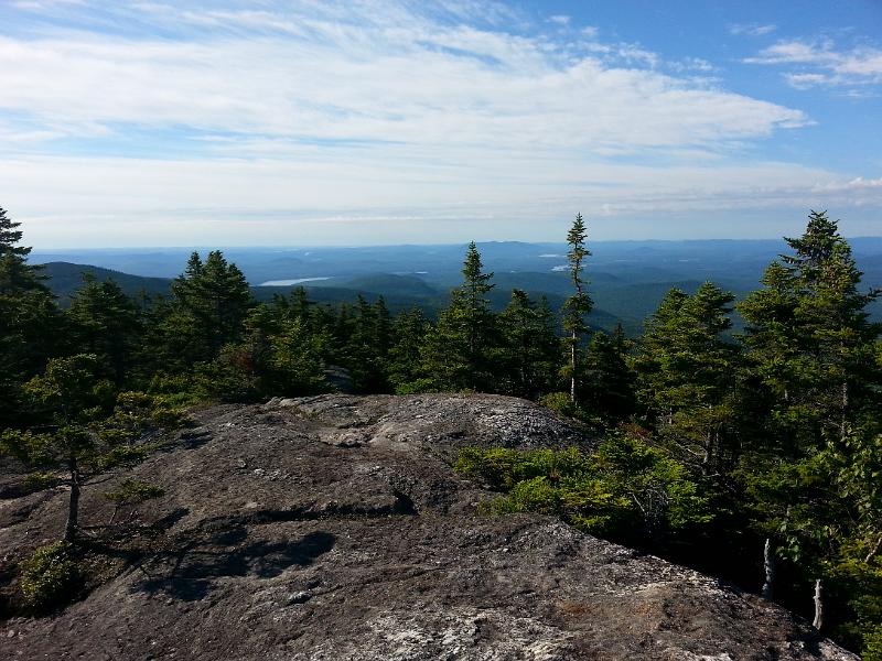 20140711_075618.jpg - Looking east into Maine I could see a lot of lakes.