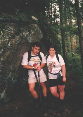 Tim and Danielle hiding from the rain